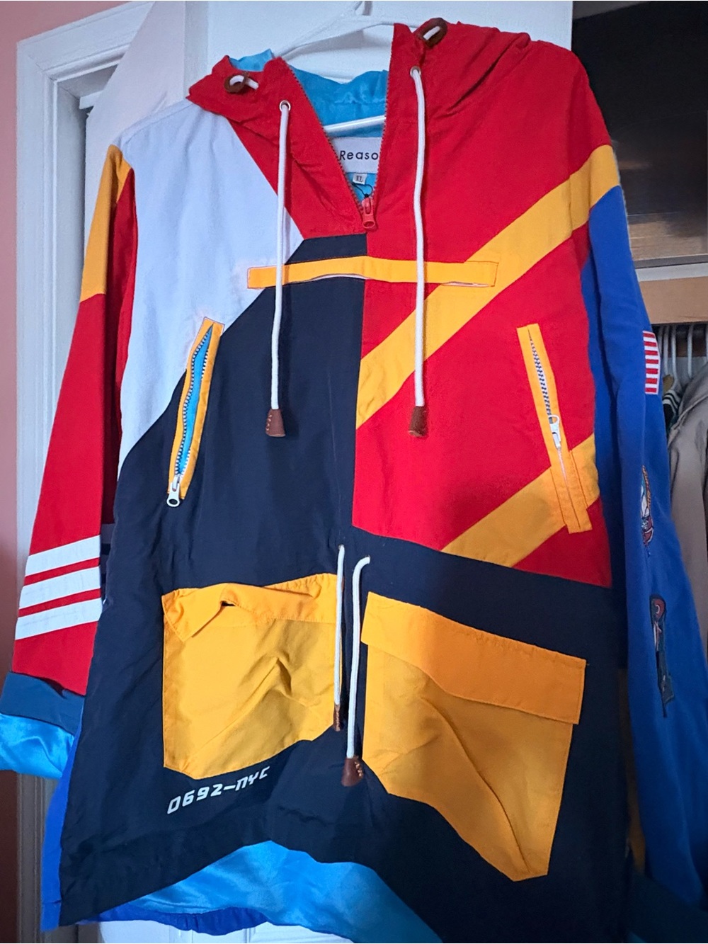 Reason Multicolor Windbreaker Jacket in Red, Yellow, Blue, Navy, White